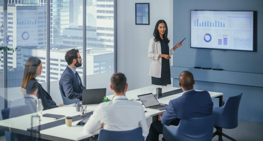 Diverse Office Conference Room Meeting Asian Female Project Manager Presents Digital Business Expansion Strategy for Investment Team, Uses Wall TV with Big Data Analysis, e-Commerce