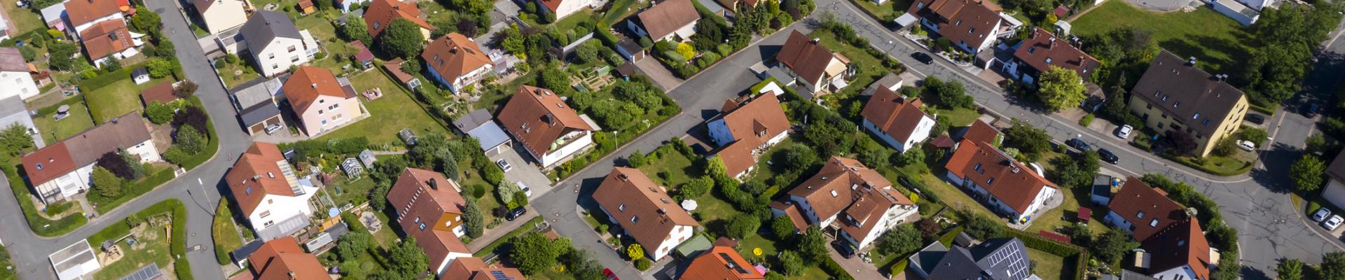 Aerial view above suburb houses