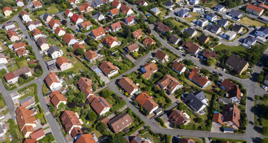 Aerial view above suburb houses